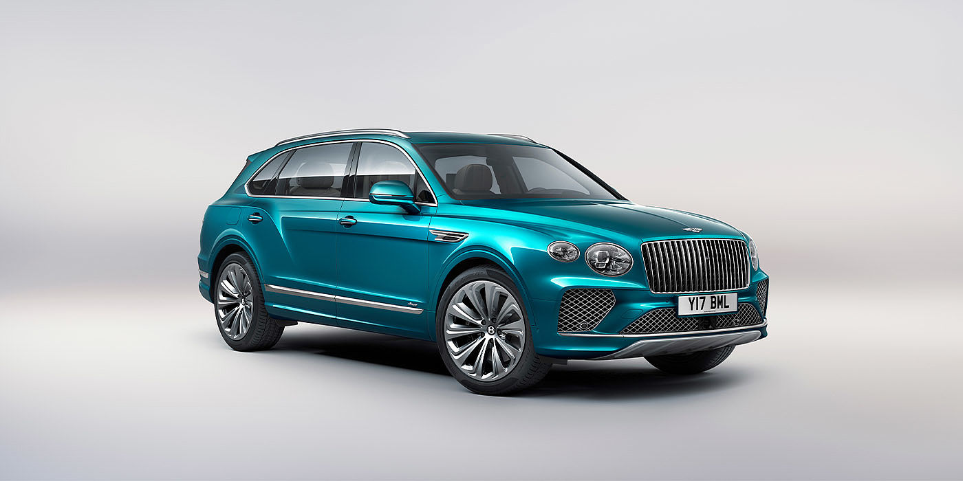 Bentley Taichung Bentley Bentayga EWB Azure front three-quarter view, featuring a fluted chrome grille with a matrix lower grille and chrome accents in Topaz blue paint.