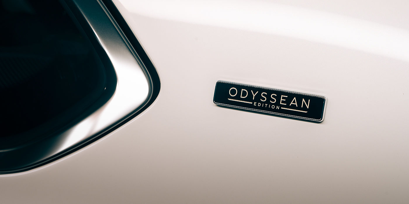 Bentley Taichung Bentley Bentayga Odyssean Edition SUV Odyssean badge close up with Snow Quartz Pearlescent by Mulliner paint