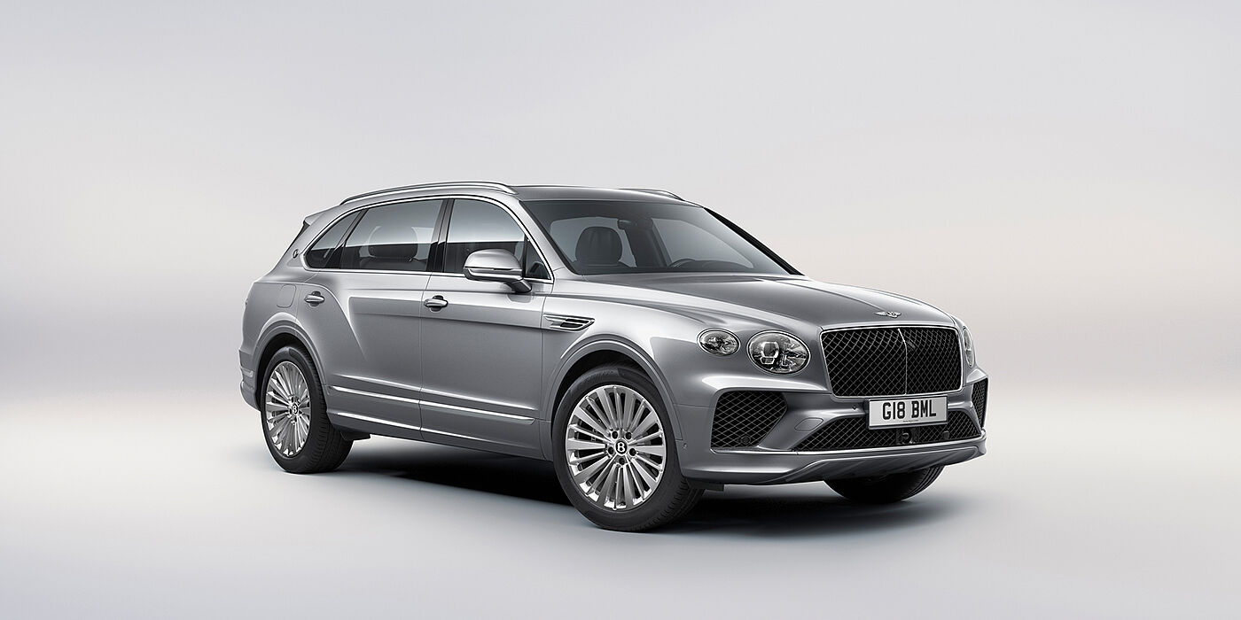 Bentley Taichung Bentley Bentayga Extended Wheelbase luxury SUV front three quarter view in Moonbeam paint with 21 inch five spoke painted wheels