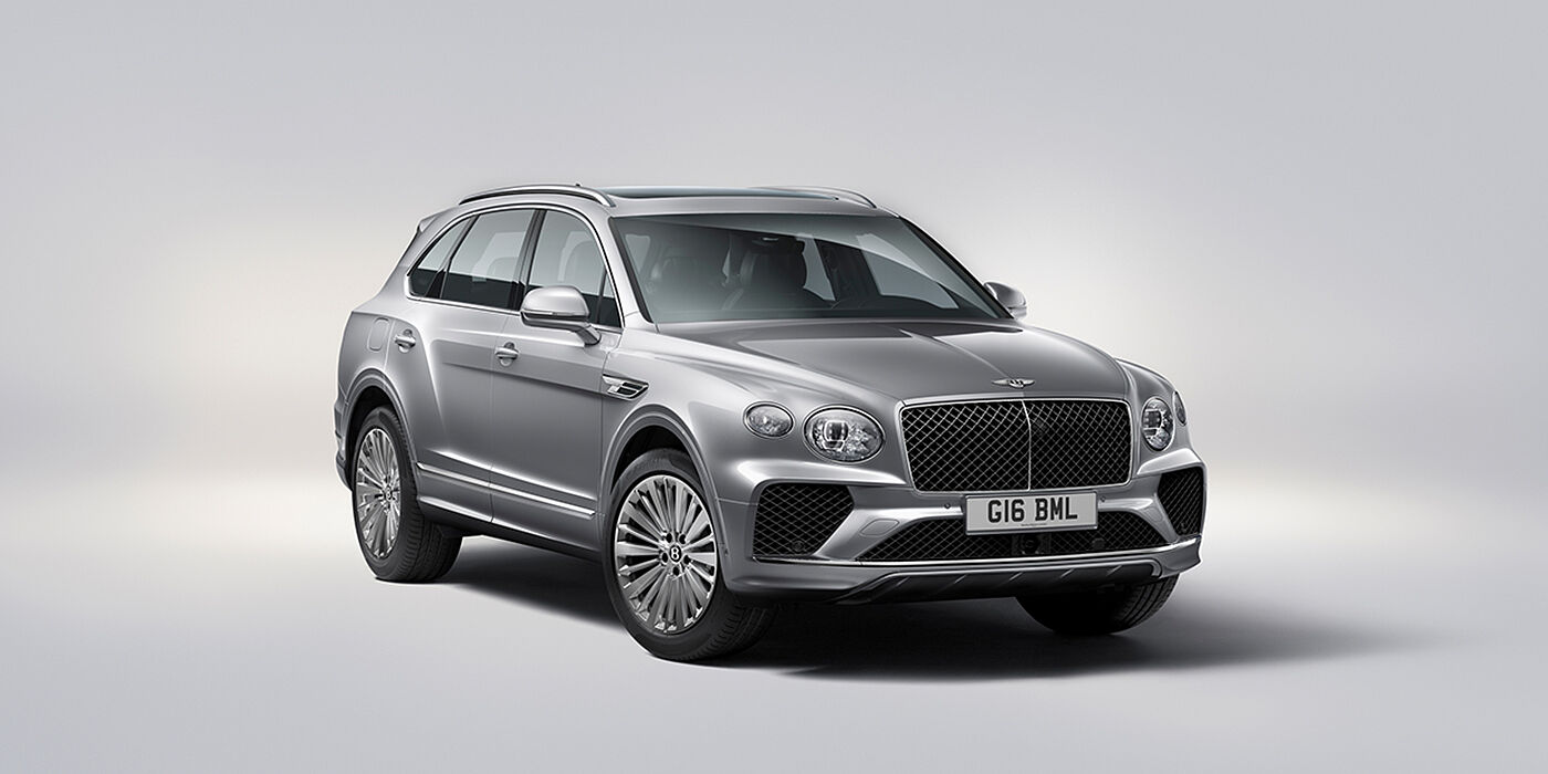 Bentley Taichung Bentley Bentayga luxury SUV front three quarter view in Moonbeam paint with matrix grille and 21″ 5 spoke painted wheels
