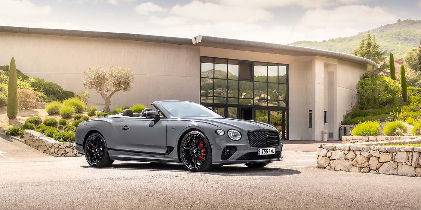 Bentley Taichung Bentley Continental GTC S convertible in Cambrian Grey paint front 34 static near house