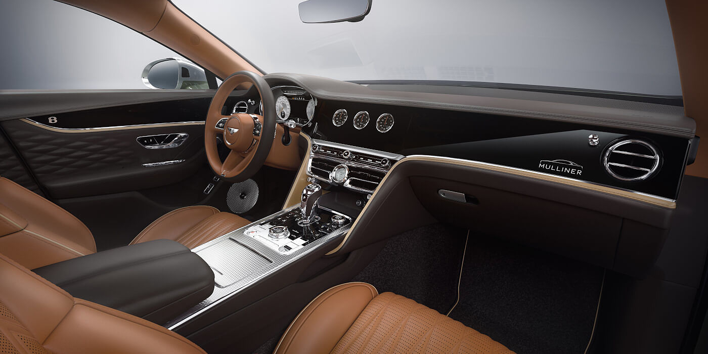 Bentley-Flying-Spur-Hybrid-Mulliner-front-interior-in-Newmarket-Tan-and-Imperial-Blue-hides-and-Piano-Black-veneer