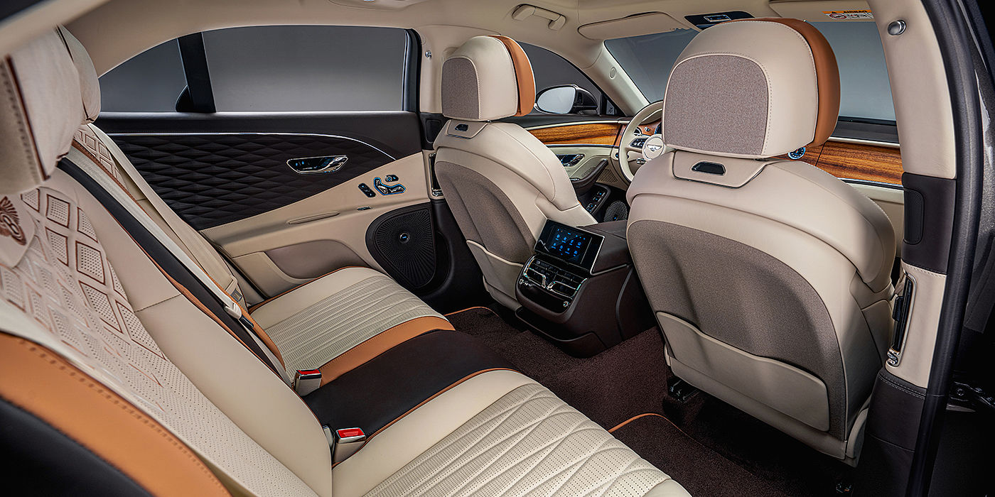 Bentley Taichung Bentley Flying Spur Odyssean sedan rear interior with Diamond in Linen and Burnt Oak hides