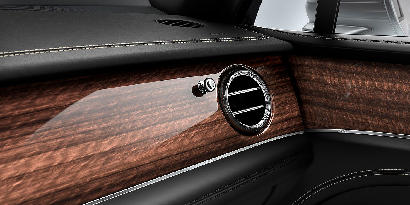 Bentley Taichung Bentley Bentayga front interior Crown Cut Walnut veneer and chrome air vent.