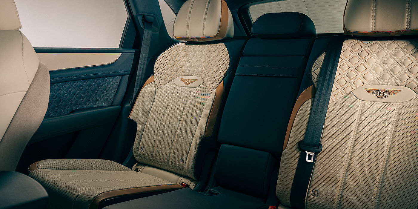 Bentley Taichung Bentley Bentayga Odyssean Edition SUV rear interior in Linen and Brunel hides with diamond in diamond seat stitching